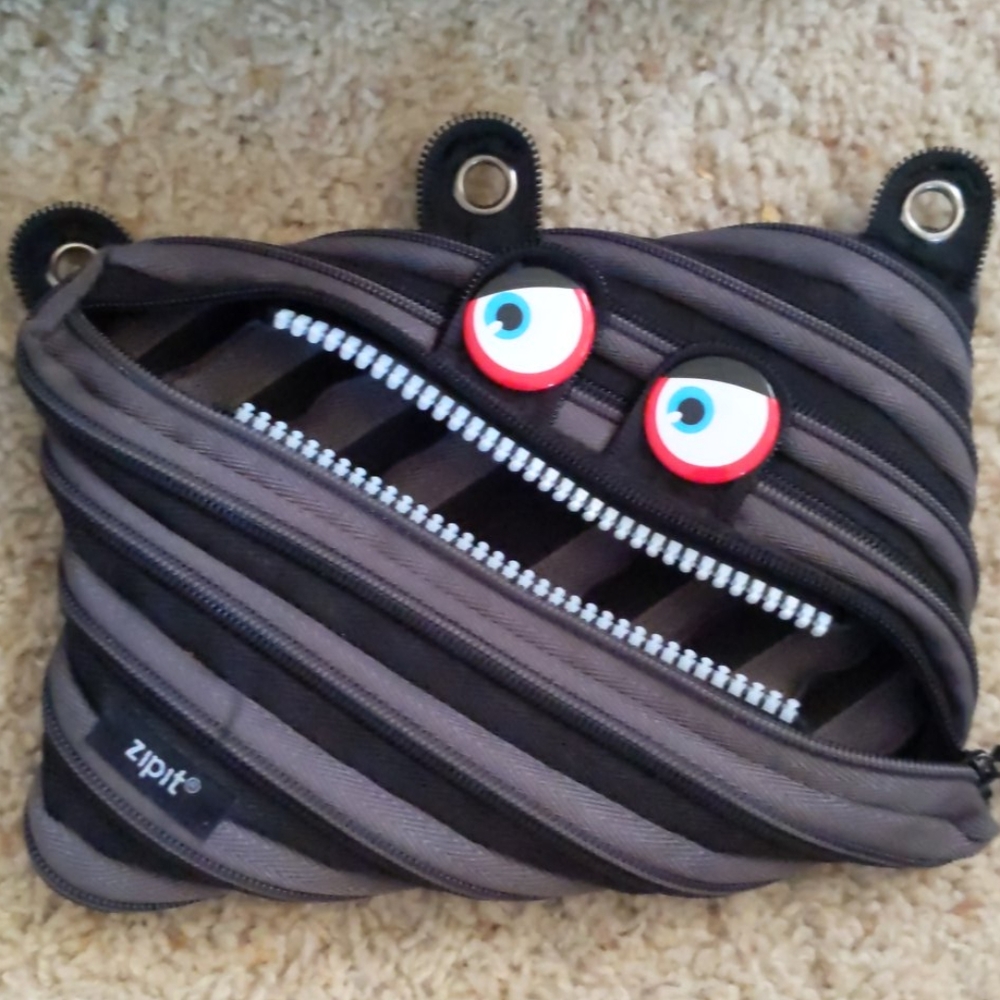 Super cute pencil pouch for school or office.
